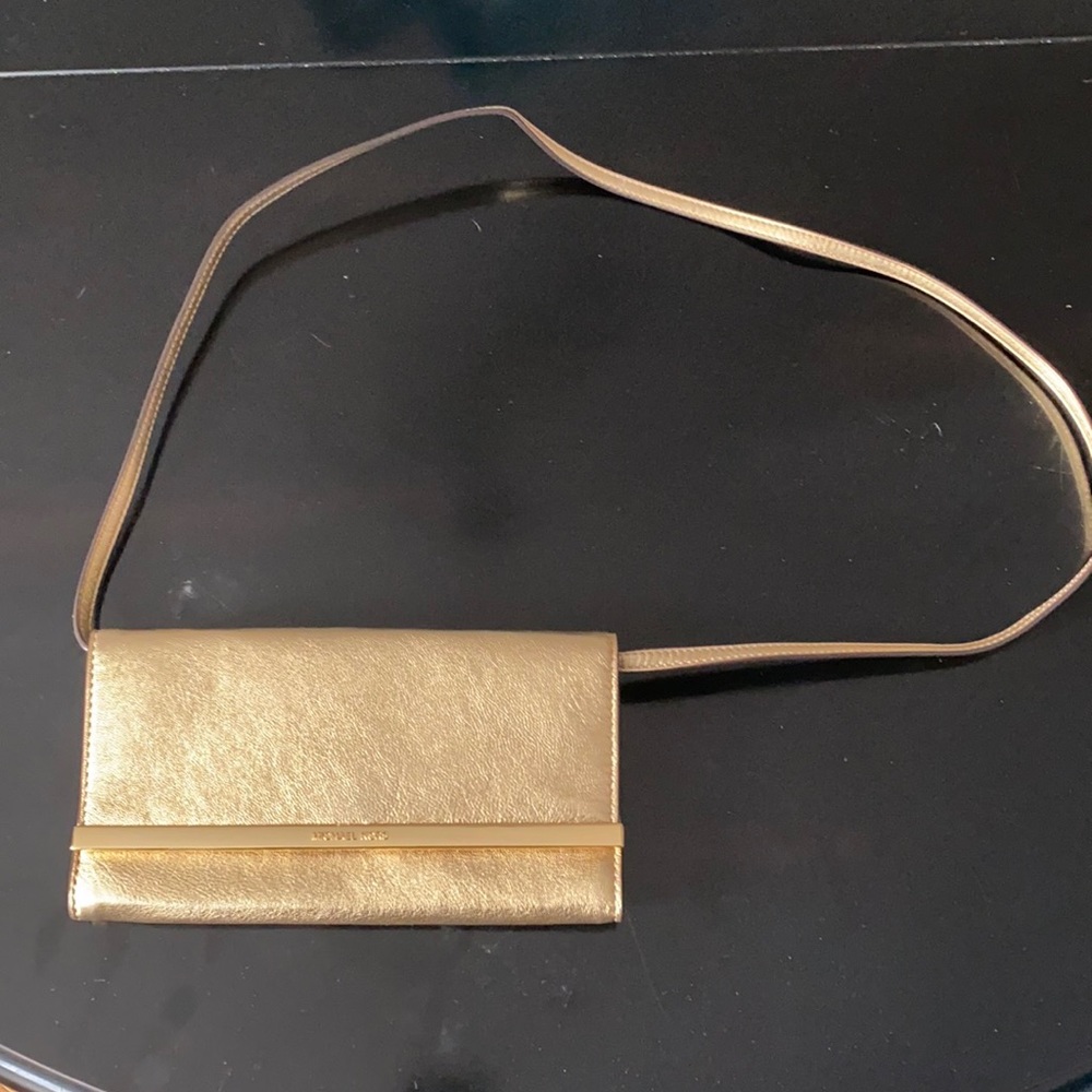 Gold Michael Kors cross body wallet type purse